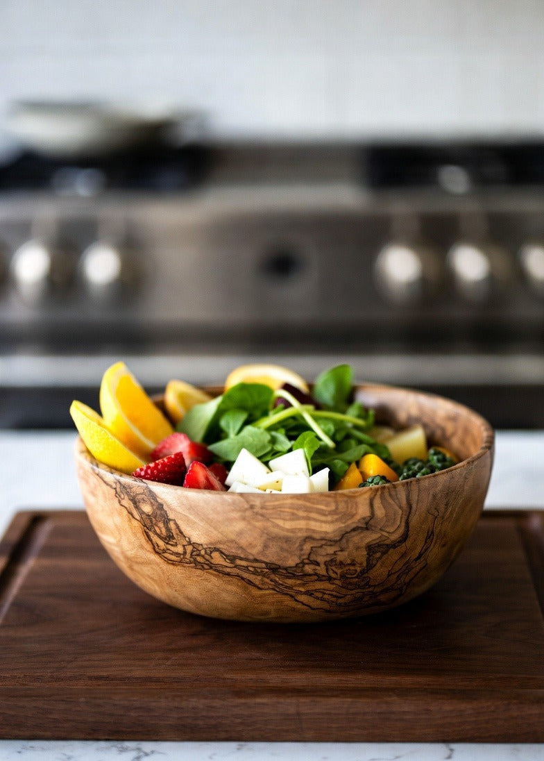 wooden bowl with salad and fruits 